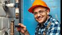 A satisfied plumber at work, showcasing professional plumbing skills.